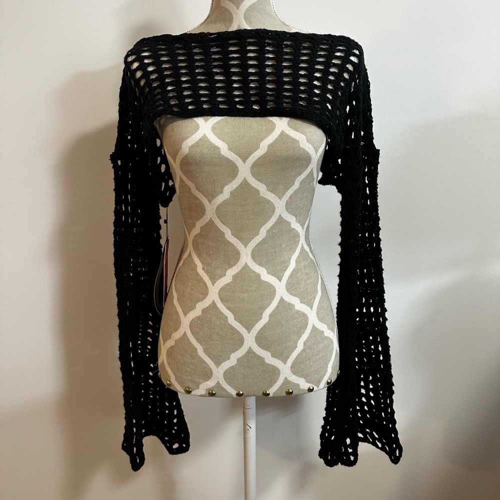 Brand new tags on knitted sweater top